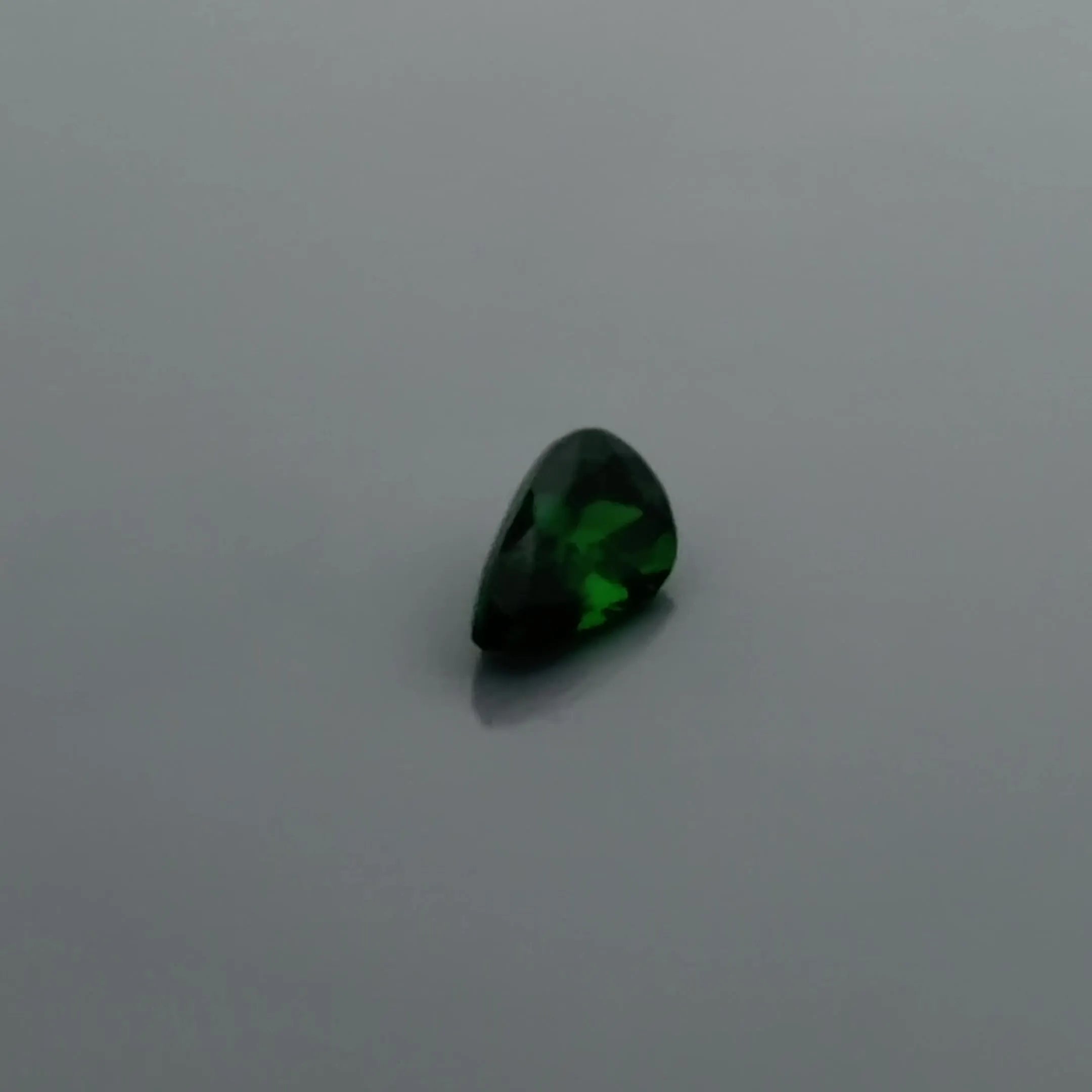 0.57ct Pear Natural Garnet (Colour Green, Clarity Slightly Included, Cut Faceted)