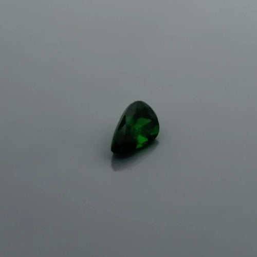 0.57ct Pear Natural Garnet (Colour Green, Clarity Slightly Included, Cut Faceted)